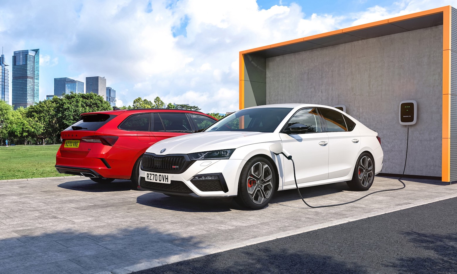 white and red Skoda Octavia vRS iV PHEV electric cars charging